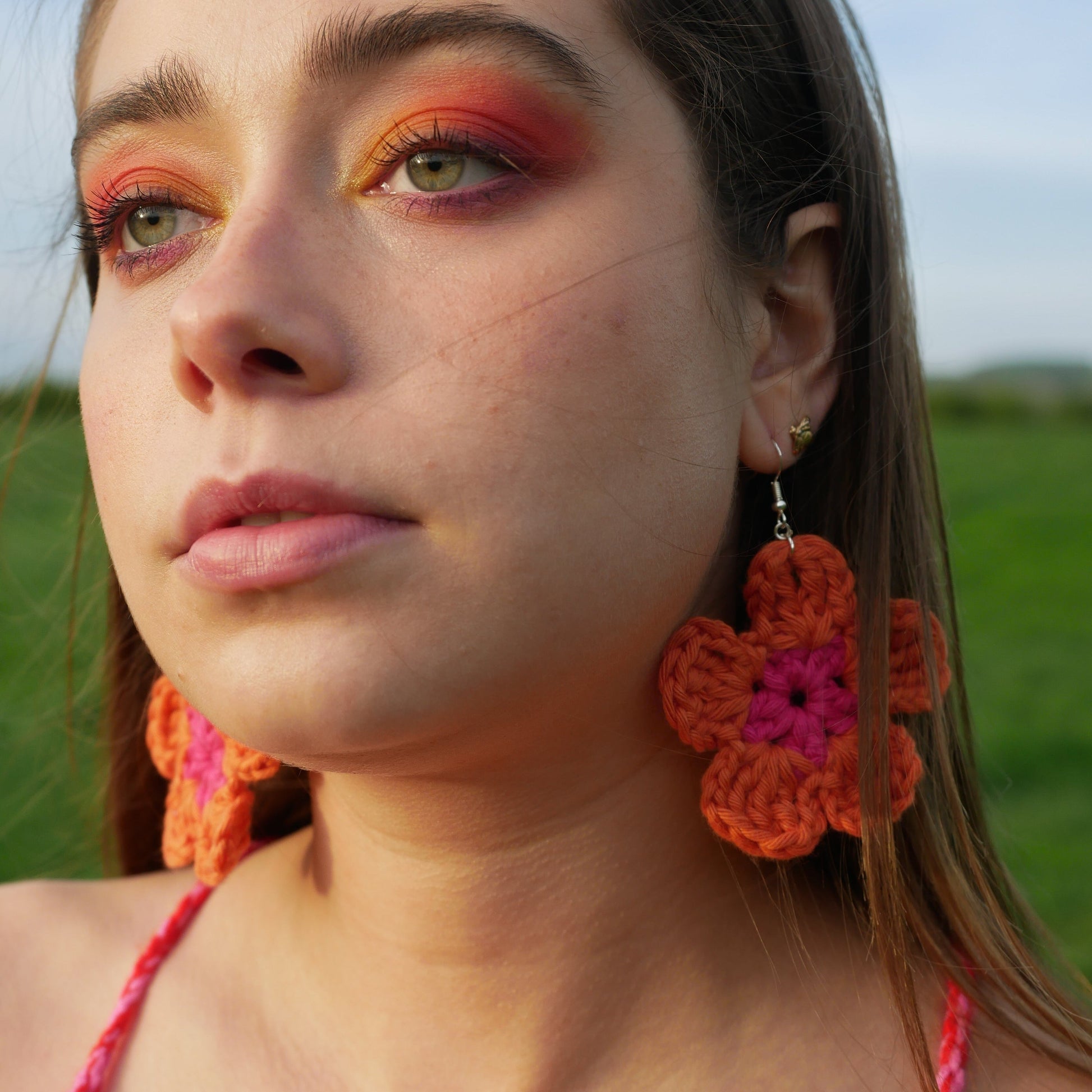 Orange flower crochet earrings Hooked By Lou